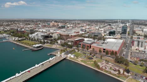 Geelong-center-and-waterfront-aerial-panorama,-coastal-port-city,-Australia