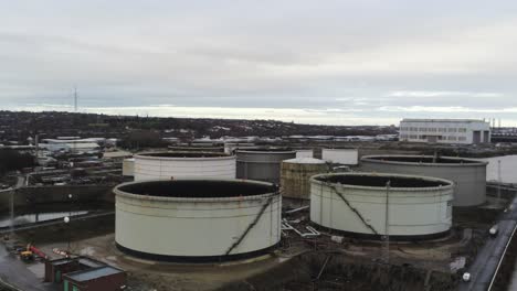 Drone-view-Tranmere-oil-terminal-tanks-Birkenhead-coastal-petrochemical-harbour-distribution-pan-right