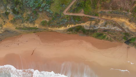 Sandy-beach-of-Twelve-Apostles-Marine-National-Park,-Australia,-aerial-view