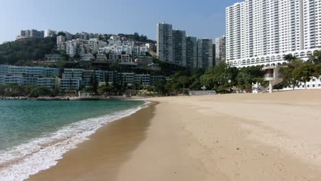 Empty-public-beach-in-Hong-Kong-due-to-Covid19-lockdown-guidelines,-Aerial-view