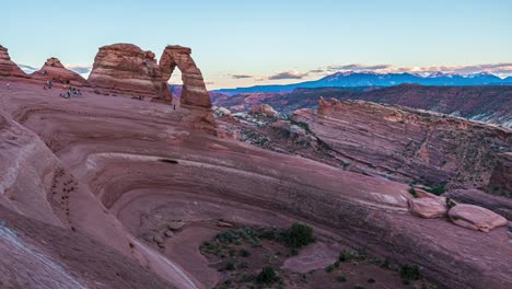 Panning-timelapse-from-day-to-sunset-with-unique-rock-formations-at-Delicate-Arch-in-Arches-National-park