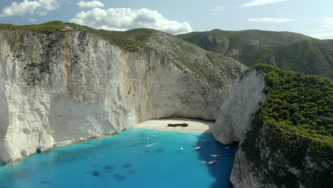 drone-aerial-zoom-out-smooth-shot-of-navagio-beach-in-Zakynthos,-Greece