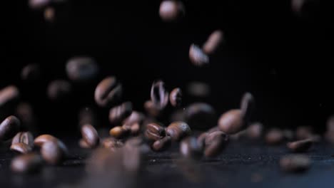 Brown-coffee-beans-dance-on-a-tray
