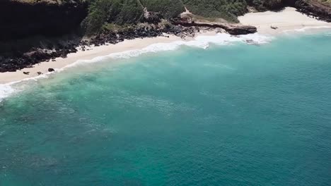 Drone-aerial-blue-water-white-sand-beach-Hawaii