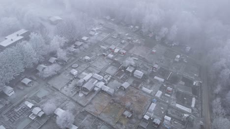 Frozen,-Snow-Covered-Houses-in-Nordic-Country-of-Sweden---Aerial