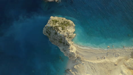 A-topdown-birds-eye-view-fo-Kerri-cliffs-at-blue-sea-water-and-high-cliff-on-the-island-of-Zakynthos,-greece-in-4k