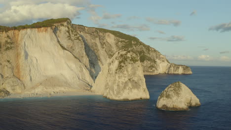 Drone-aerial-shot-of-the-high-kerri-cliffs-on-the-island-of-Zakynthos,-Greece-in-4k