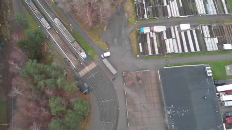 Aerial-view-of-travelers-at-a-tram-station-in-Gothenburg,-Sweden