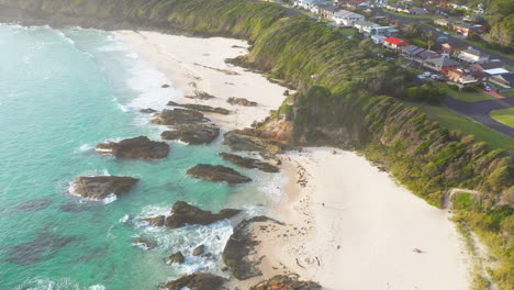 Forster-coastal-town-Burgess-Beach-on-Australian-east-coast,-aerial-footage