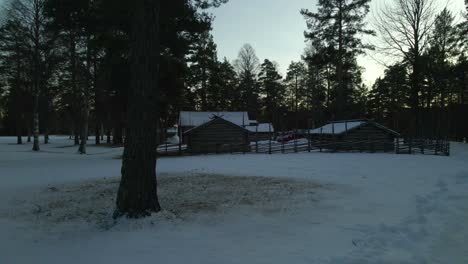 Log-Cabin-and-Fence,-Winter-Vacation-Home,-Dolly-Left