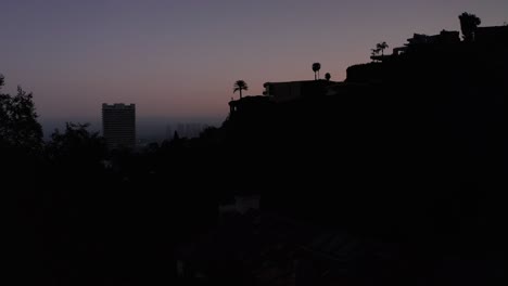 Rising-shot-of-Century-City-at-twilight-with-hazy-air