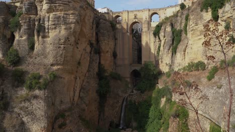 Wide-exterior-view-of-the-popular-Ronda-Bridge,-also-called-Nuevo-Bridge-in-the-mountains-over-Tajo-gorge-in-Spain