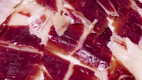 Extreme-Closeup-of-Sliced-Jamon-Iberico,-Gourmet-Spanish-Cured-Ham