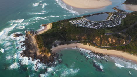Cinematic-revealing-drone-shot-of-Wellington-Rocks,-Foster-beach,-the-Nambucca-River-and-ocean-at-Nambucca-Heads-New-South-Wales-Australia