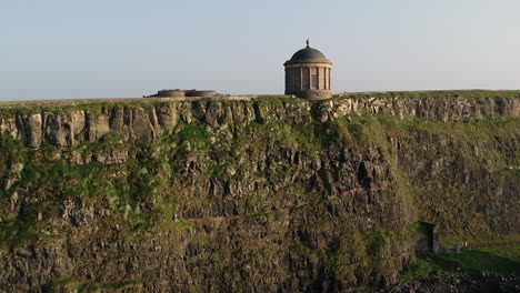 Aerial-View-of-Mussenden-Temple,-Downhill-Demesne,-Northern-Ireland-UK