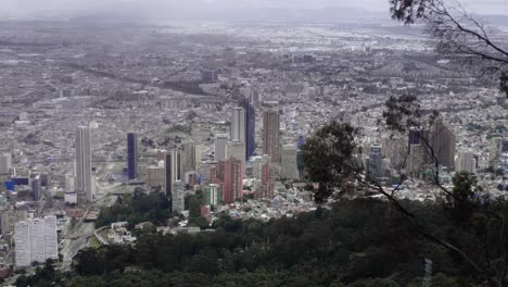 A-view-of-the-city-of-Bogotá,-Colombia-from-the-public-aerial-lift-cable-car-in-the-hills-of-Monserrate