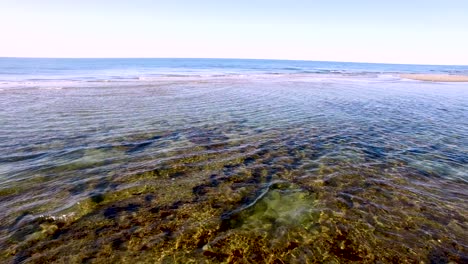 Aerial,-close-up-low-angle,-receding-tide,-Rocky-Point,-Puerto-Peñasco,-Gulf-of-California,-Mexico