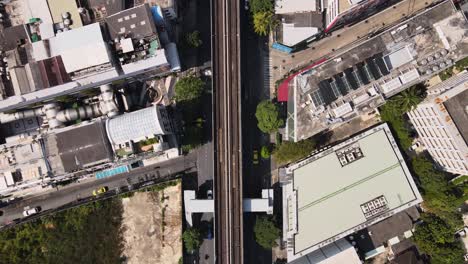 4k-time-lapse-footage-of-top-view-perspective-of-traffic-in-an-urban-neighborhood-of-Bangkok,-Thailand