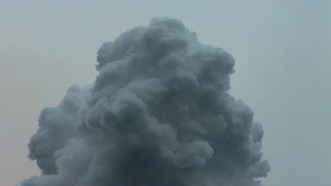 White-cloud-of-smoke-rises-to-sky