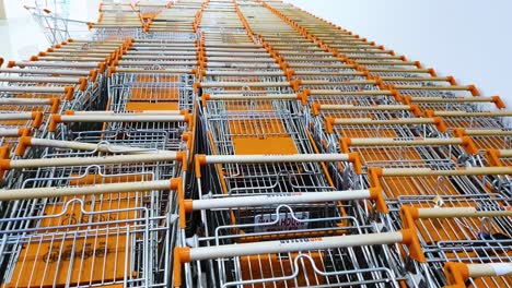Shopping-trollies-lying-vacant-in-line-stack-at-the-shopping-mall-due-to-Covid