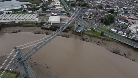 Newport-transporter-bridge-landmark-crossing-high-birdseye-aerial-view-orbit-right