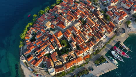Beautiful-Croatian-tourist-destination,-Korčula-old-town-and-harbour,-aerial