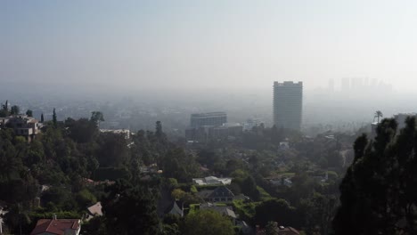 Low-aerial-shot-of-Century-City-with-bad-visibility-and-smoky-haze-in-the-air