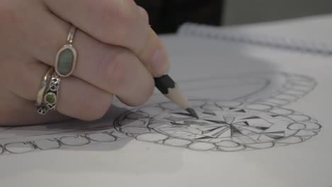 Close-up-designing-a-custom-wedding-ring-sketch-5
