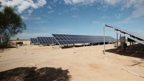 Solar-panels-in-a-desert-field-in-an-arid-landscape