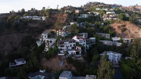 Panning-and-rising-aerial-shot-of-Beverly-Hills-mansions-dotting-the-hillside