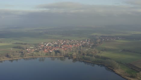 Drone-Aerial-of-the-Lake-Seeburg-Seeburger-See-on-a-beautiful-sunday-morning-in-the-Harz-national-Park-near-Göttingen-in-central-germany