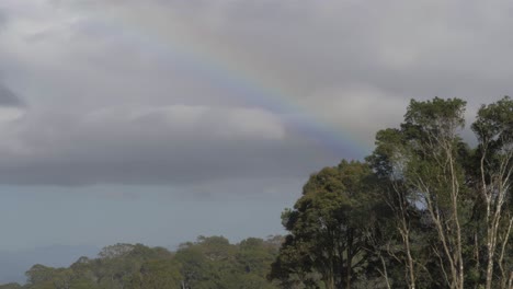 Rainbow-In-The-Sky-View-From-O'Reilly's-Rainforest-Retreat-In-Lamington-National-Park---Gold-Coast-Hinterland,-Queensland