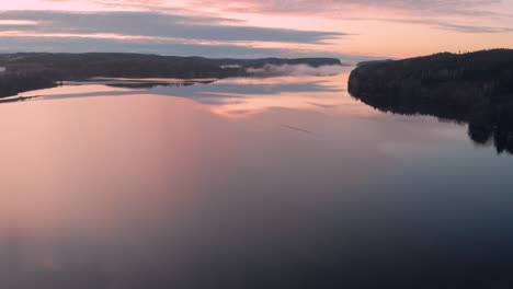 Golden-Twilight-Cloudscape-Reflection-in-Lake.-Aerial-Landscape