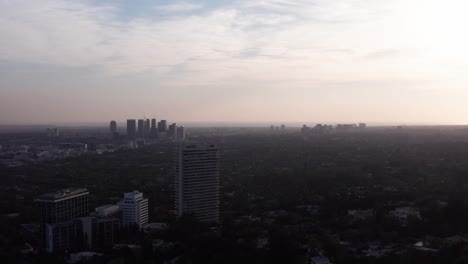 Wide-aerial-shot-of-Century-City-and-Beverly-Hills-with-low-afternoon-light