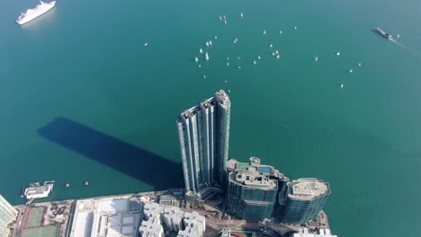 Mega-residential-waterfront-building-complex-in-Hong-Kong-bay,-Aerial-view