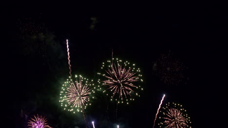 Multiple-colorful-fireworks-streak-into-the-night-sky