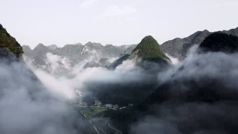 Aerial:-amazing-cloudy-karst-mountain-landscape-in-remote-China