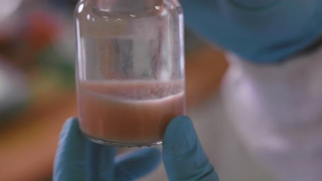 Chemical-liquid-in-a-glass-vial-in-4k