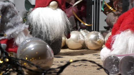 Christmas-decorations-with-toy-elf-and-shiny-balls