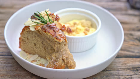 banana-cake-with-cream-cheese-and-crumble-on-plate