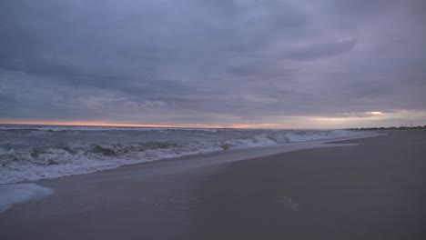 Stormy-Weather-At-The-Beach-With-Rough-Sea-And-Overcast-Dramatic-Sky-During-Sunset-Slow-Motion---Wide-Static-Shot