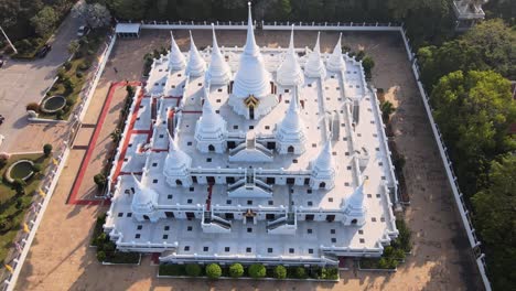 4k-Aerial-Top-Down-footage-of-the-Wat-Asokaram-temple-at-Sunset-in-Bangkok,-Thailand