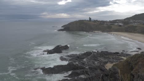 Scenic-View-Of-Scott's-Head-Coastal-Village-In-Nambucca-Valley-On-An-Overcast-Day---Pacific-Ocean-Coast,-NSW,-Australia---aerial,-slow-motion