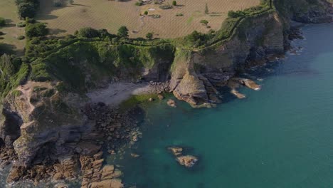 Rocky-Torquay-Coast-in-UK-with-Aerial-Reveal-of-Thatcher-Island