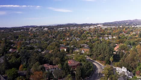 Low-aerial-panning-shot-of-Pasadena-neighborhood