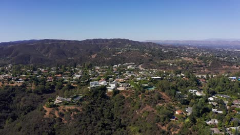 Super-wide-aerial-shot-of-a-hills-community-above-Sherman-Oaks