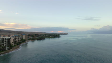 Aerial-view-on-Hololani-seafront-resort-on-coast-of-Maui-Island,-USA