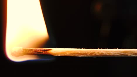 Slowmotion-macro-shots-of-matches-being-lit-and-running-out-creating-different-shapes