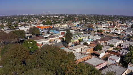 Low-aerial-panning-shot-over-a-South-LA-neighborhood