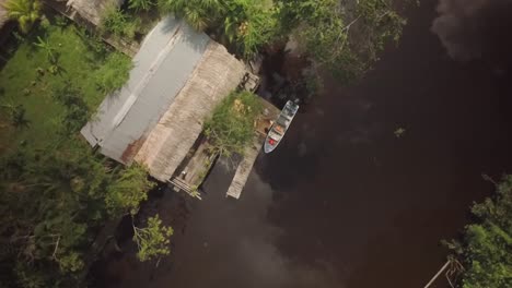 Aerial-view-of-an-indigenous-floating-house-in-the-Orinoco-River-Delta,-Venezuela